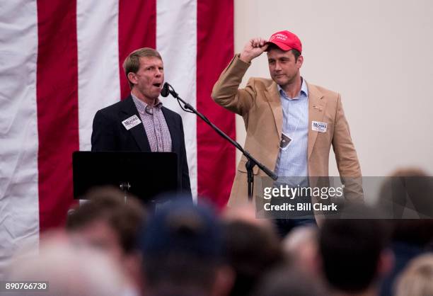 Paul Nehlen, right, primary challenger to Speaker of the House Paul Ryan, R-Wisc., is introduced on stage during the "Drain the Swamp" Roy Moore...