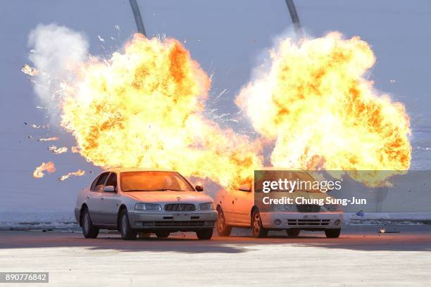 Cars explode during a anti-terror drill at the Olympic Staduim, venue of the Opening and Closing ceremony, on December 12, 2017 in Pyeongchang-gun,...