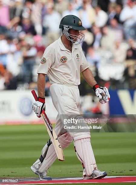 Simon Katich of Australia walks back after being dismissed by Graham Onions of England during day two of the npower 2nd Ashes Test Match between...
