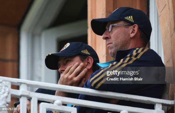 Ricky Ponting of Australia watches from the team balcony with coach Tim Nielsen during day two of the npower 2nd Ashes Test Match between England and...