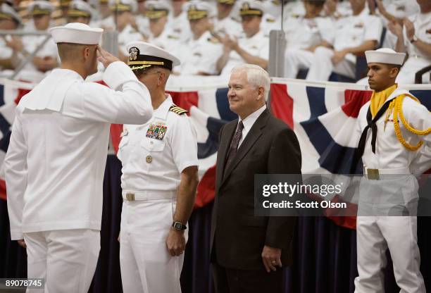 Defense Secretary Robert Gates with Captain John Peterson , Commanding Officer of Recruit Training Command, greet award recipients during a...