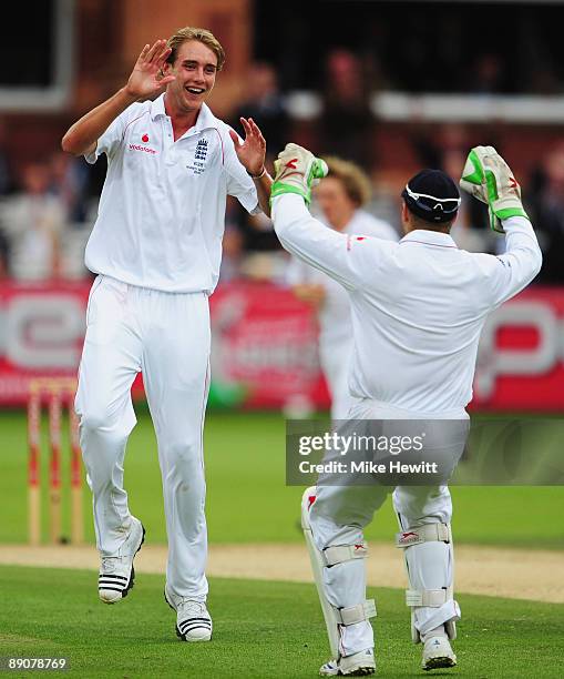 Stuart Broad of England celebrates the wicket of Brad Haddin of Australia with Matt Prior during day two of the npower 2nd Ashes Test Match between...