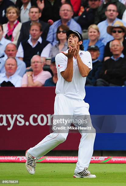 Alastair Cook of England takes the catch to dismiss Mitchell Johnson of Australia during day two of the npower 2nd Ashes Test Match between England...