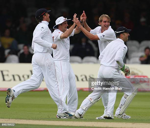 Stuart Broad of England celebrates the wicket of Brad Haddin of Australia with captain Andrew Strauss during day two of the npower 2nd Ashes Test...