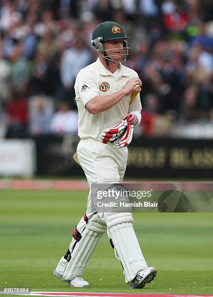 Brad Haddin of Australia walks back after being dismissed by Stuart Broad of England during day two of the npower 2nd Ashes Test Match between...