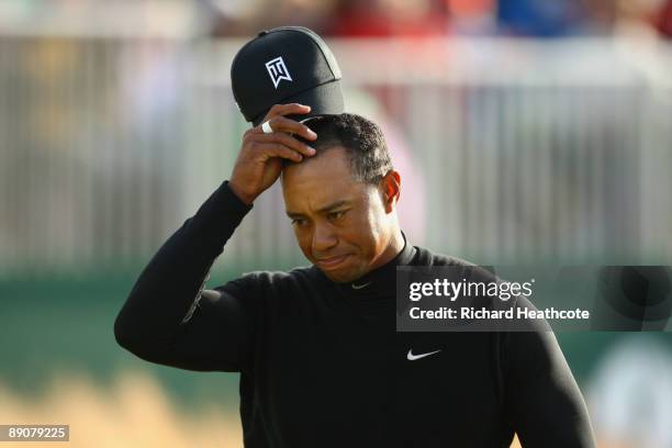 Tiger Woods of USA acknowledges the crowd as he leaves the 18th green during round two of the 138th Open Championship on the Ailsa Course, Turnberry...