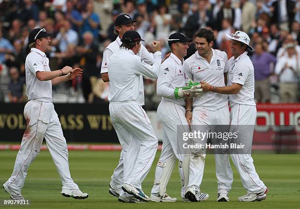 James Anderson of England celebrates the wicket of Marcus North of Australia with team mates during day two of the npower 2nd Ashes Test Match...