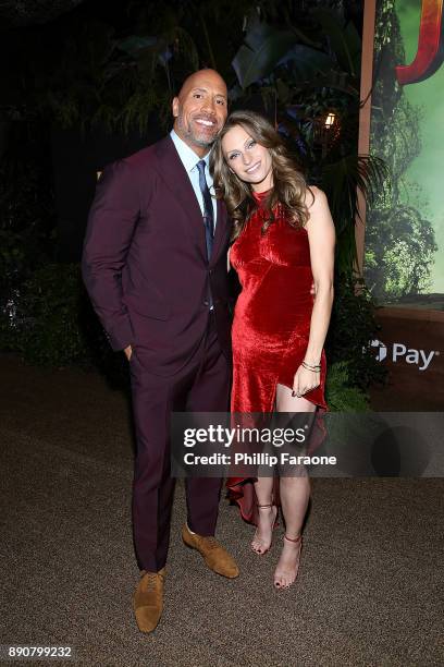 Dwayne Johnson and Lauren Hashian attend the premiere of Columbia Pictures' "Jumanji: Welcome To The Jungle" on December 11, 2017 in Hollywood,...