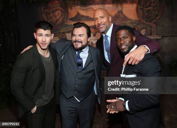 Nick Jonas, Jack Black, Dwayne Johnson, and Kevin Hart attend the premiere of Columbia Pictures' "Jumanji: Welcome To The Jungle" on December 11,...