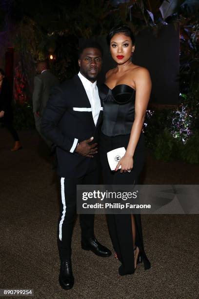Kevin Hart and Eniko Parrish attend the premiere of Columbia Pictures' "Jumanji: Welcome To The Jungle" on December 11, 2017 in Hollywood, California.