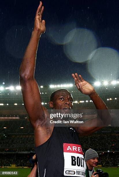 Usain Bolt of Jamaica waves to the crowd following his victory in the Mens 100m during the IAAF Golden League Track and Field meeting on July 17,...