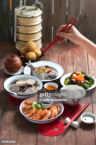 chinese new year food and drink still life. selective focus image. - lunar new year cup 2017 stock-fotos und bilder