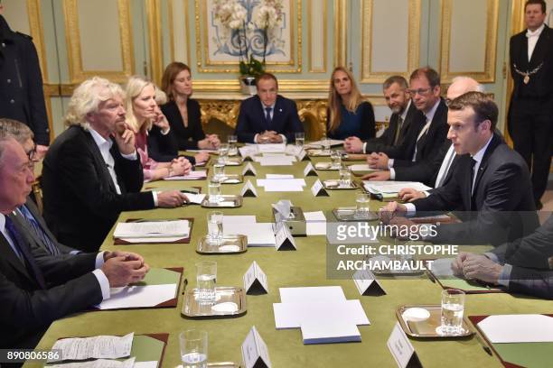 French President Emmanuel Macron meets with US businessman and politician Michael Bloomberg , US entrepreneur Bill Gates , British entrepreneur...