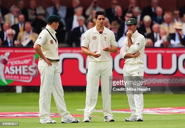 Ricky Ponting of Australia talks with Mitchell Johnson and Peter Siddle during day two of the npower 2nd Ashes Test Match between England and...