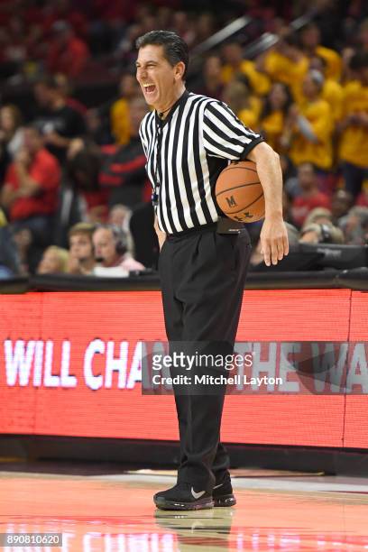 Referee Gene Steratore looks on during a college basketball game between the Purdue Boilermakers and the Maryland Terrapins at the Xfinity Center on...