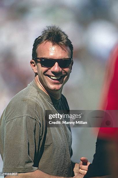 Closeup of San Francisco 49ers QB Joe Montana casual on sidelines during game vs New York Jets. Montana sustained elbow injury in January 1992 and...