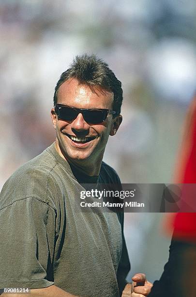 Closeup of San Francisco 49ers QB Joe Montana casual on sidelines during game vs New York Jets. Montana sustained elbow injury in January 1992 and...