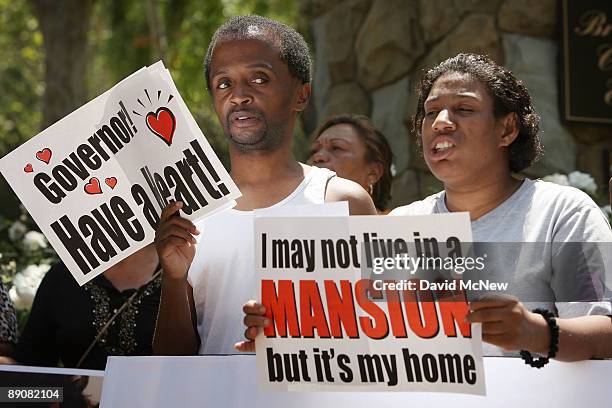 Protesters demonstrate against cuts to social services that aid people with disabilities and the poor at the home of California Gov. Arnold...