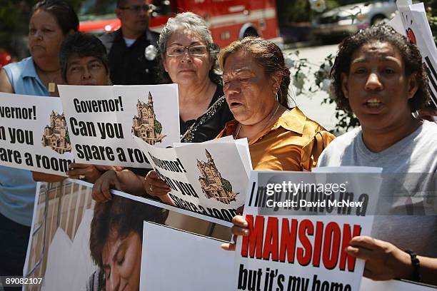 Protesters demonstrate against cuts to social services that aid people with disabilities and the poor at the home of California Gov. Arnold...