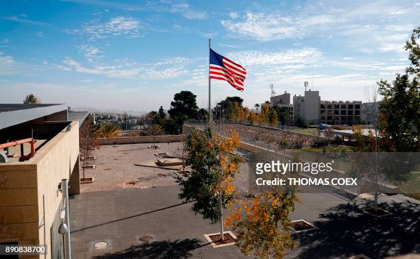 Picture taken on December 12 shows a partial view of the US consulate building complex in Jerusalem with the US flag flying. The Middle East saw few...