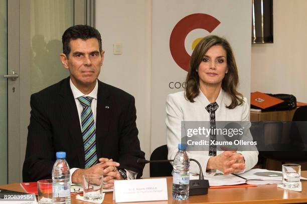 Queen Letizia of Spain and Spanish ambassador to Senegal Alberto Virella attend a meeting at the the Spanish Cooperation Agency on December 12, 2017...