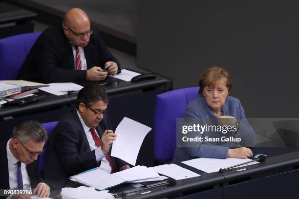 German Chancellor and leader of the German Christian Democarts Angela Merkel attends debates and votes at the Bundestag over German foreign military...