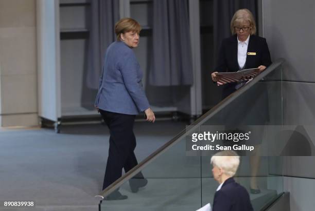 German Chancellor and leader of the German Christian Democarts Angela Merkel attends debates and votes at the Bundestag over German foreign military...
