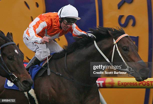 Darren Gauci riding I Am Invincible wins race 6 the Sir John Monash Stakes during the Sir John Monash Stakes Day at Caulfield Racecourse on July 18,...