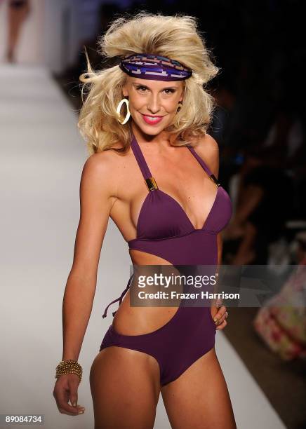 Model walks the runway at the L*Space by Monica 2010 fashion show during Mercedes-Benz Fashion Week Swim at the Cabana Grande at The Raleigh on July...