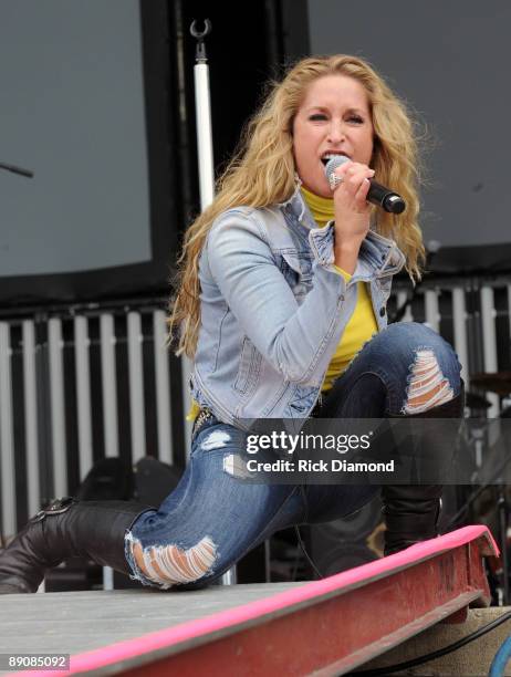 Singer/Songwriter Heidi Newfield performs at the 17th Annual Country Thunder USA music festival on July 17, 2009 in Twin Lakes, Wisconsin.