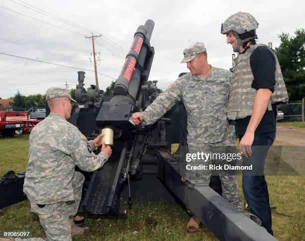 Musician Jake Owen fires the 105mm How. At the 17th Annual Country Thunder USA music festival on July 17, 2009 in Twin Lakes, Wisconsin.