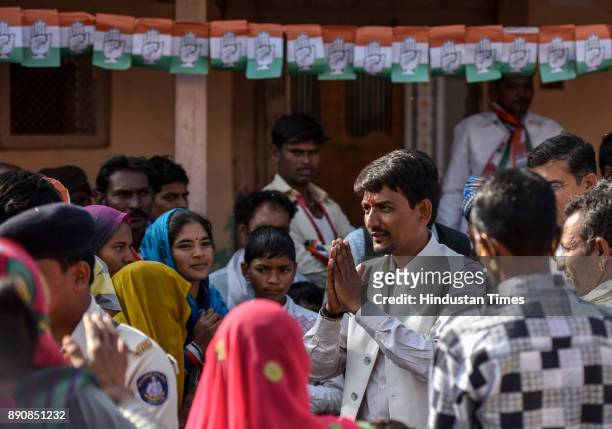 Congress candidate from Radhanpur constituency Alpesh Thakor greets people during election campaign at Radhanpur , on December 11, 2017 in Patan,...