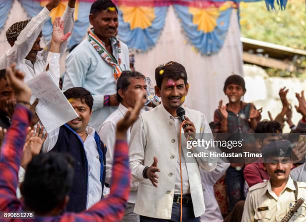 Congress candidate from Radhanpur constituency Alpesh Thakor greets people during election campaign at Radhanpur , on December 11, 2017 in Patan,...