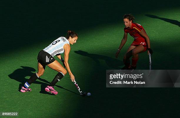 Luciana Aymar of Argentina takes on the defence during the Women's Hockey Champions Trophy match between Argentina and Germany at Sydney Olympic Park...