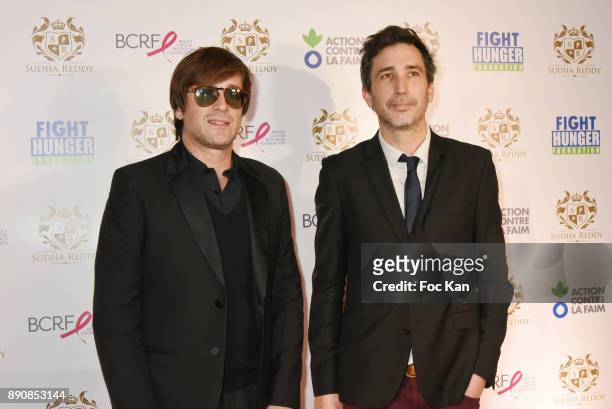 Singer Thomas Dutronc and President of 'Action Contre La Faim' Thomas Ribemont attend The Fight Hunger and The Breast Cancer Research Foundations...