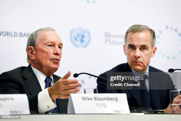 Special envoy to the United Nations for climate change Michael Bloomberg attends a press conference next to Bank of England Governor Mark Carney...