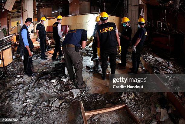 The damage inflicted by a bomb blast on a restaurant of the JW Marriot hotel is seen on July 18, 2009 in Jakarta, Indonesia. At least nine people,...