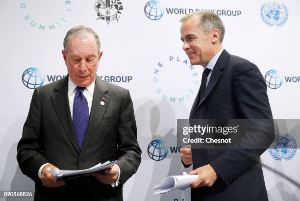 Special envoy to the United Nations for climate change Michael Bloomberg and Bank of England Governor Mark Carney attend a press conference during...