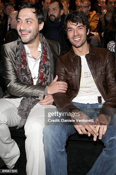 Actors Filippo Timi and Luca Argentero attend the Dolce & Gabbana show as part of Milan Fashion Week Autumn/Winter 2009/10 Menswear on January 17,...