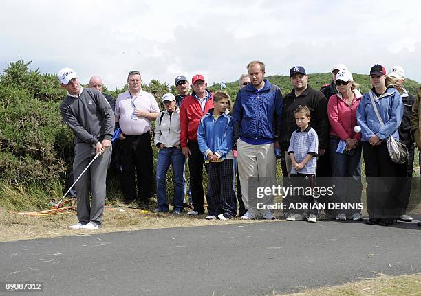 South African golfer Branden Grace chips onto the 6th green, on the third day of the 138th British Open Championship at Turnberry Golf Course in...