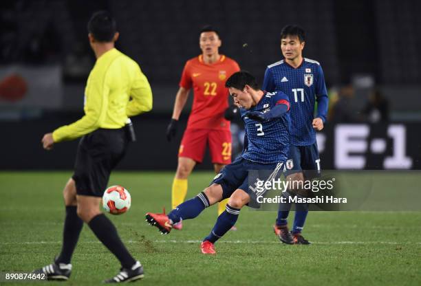 Gen Shoji of Japan scores his side's second goal during the EAFF E-1 Men's Football Championship between Japan and China at Ajinomoto Stadium on...