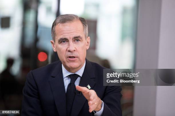 Mark Carney, governor of the Bank of England , gestures while speaking during a Bloomberg Television interview at the One Planet Summit in Paris,...