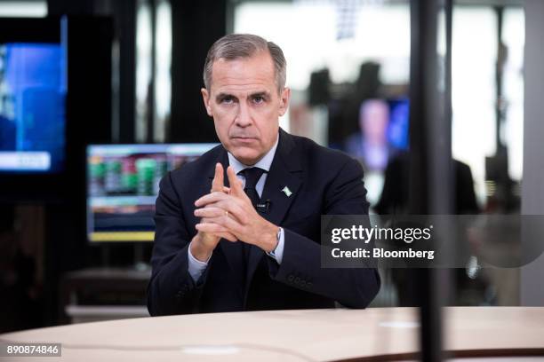 Mark Carney, governor of the Bank of England , gestures during a Bloomberg Television interview at the One Planet Summit in Paris, France, on...