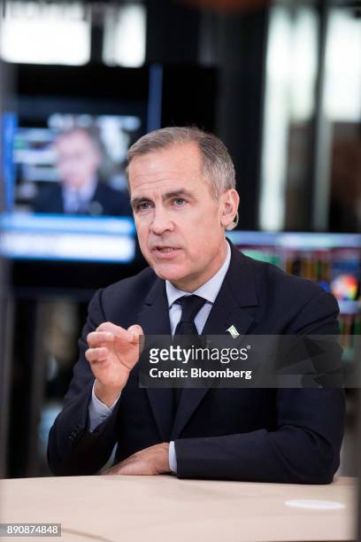Mark Carney, governor of the Bank of England , gestures while speaking during a Bloomberg Television interview at the One Planet Summit in Paris,...
