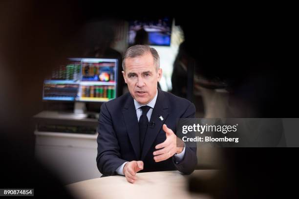 Mark Carney, governor of the Bank of England , gestures while speaking during a Bloomberg Television interview at the One Planet Summit in Paris,...