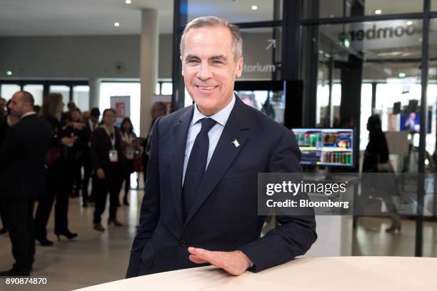 Mark Carney, governor of the Bank of England , poses for a photograph following a Bloomberg Television interview at the One Planet Summit in Paris,...