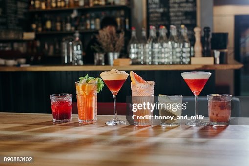 Selection of cocktails on a bar counter Selection of cocktails on a bar counter
