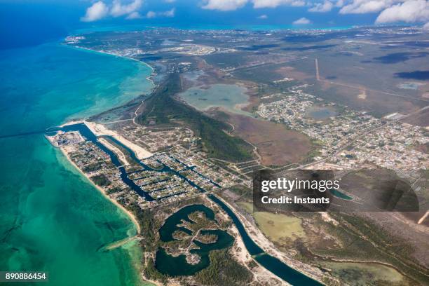 aerial view of nassau, as shot from a plane. - bahamas stock pictures, royalty-free photos & images