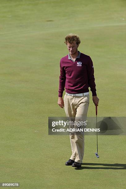English golfer Chris Wood walks on the 15th green, on the third day of the 138th British Open Championship at Turnberry Golf Course in south west...