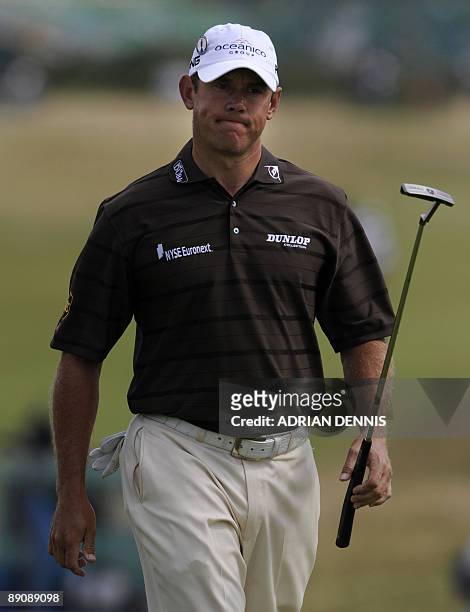 English golfer Lee Westwood walks on the 7th green, on the third day of the 138th British Open Championship at Turnberry Golf Course in south west...